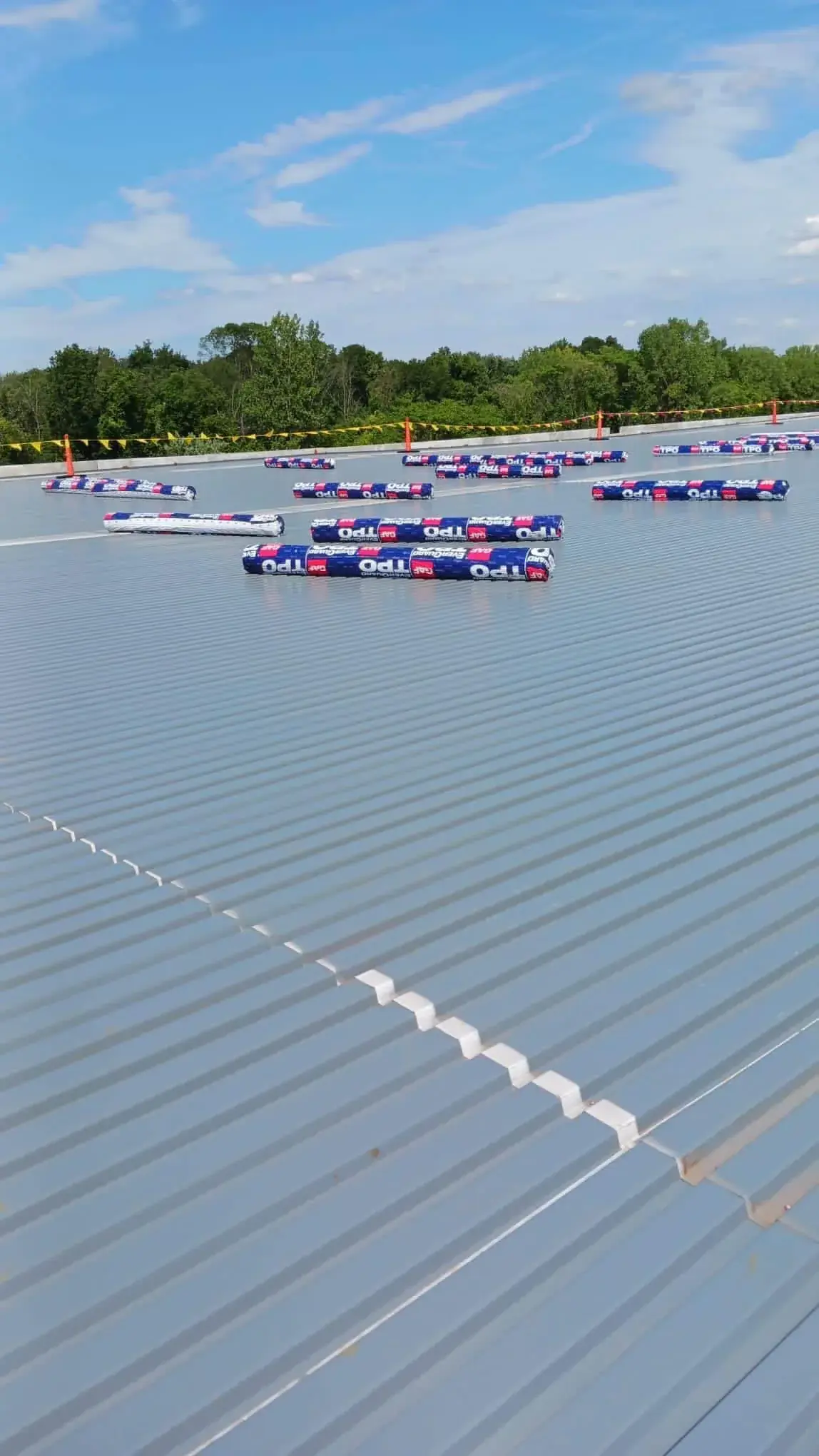 Roof Monsters crew installing roofing materials